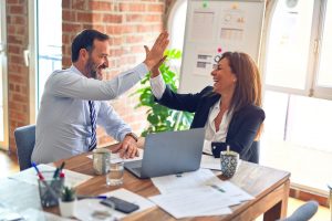 Two people high fiving - Customer Win-Back Email